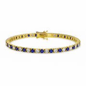 14K gold tennis bracelet with alternating sapphire and diamond stones, elegant fine jewelry design