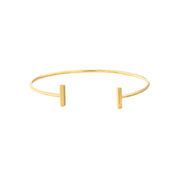 Minimalist 14K gold cuff bracelet with sleek vertical bars, timeless fine jewelry for everyday wear