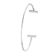 Minimalist silver bangle with sleek bar accents, timeless fine jewelry for everyday wear