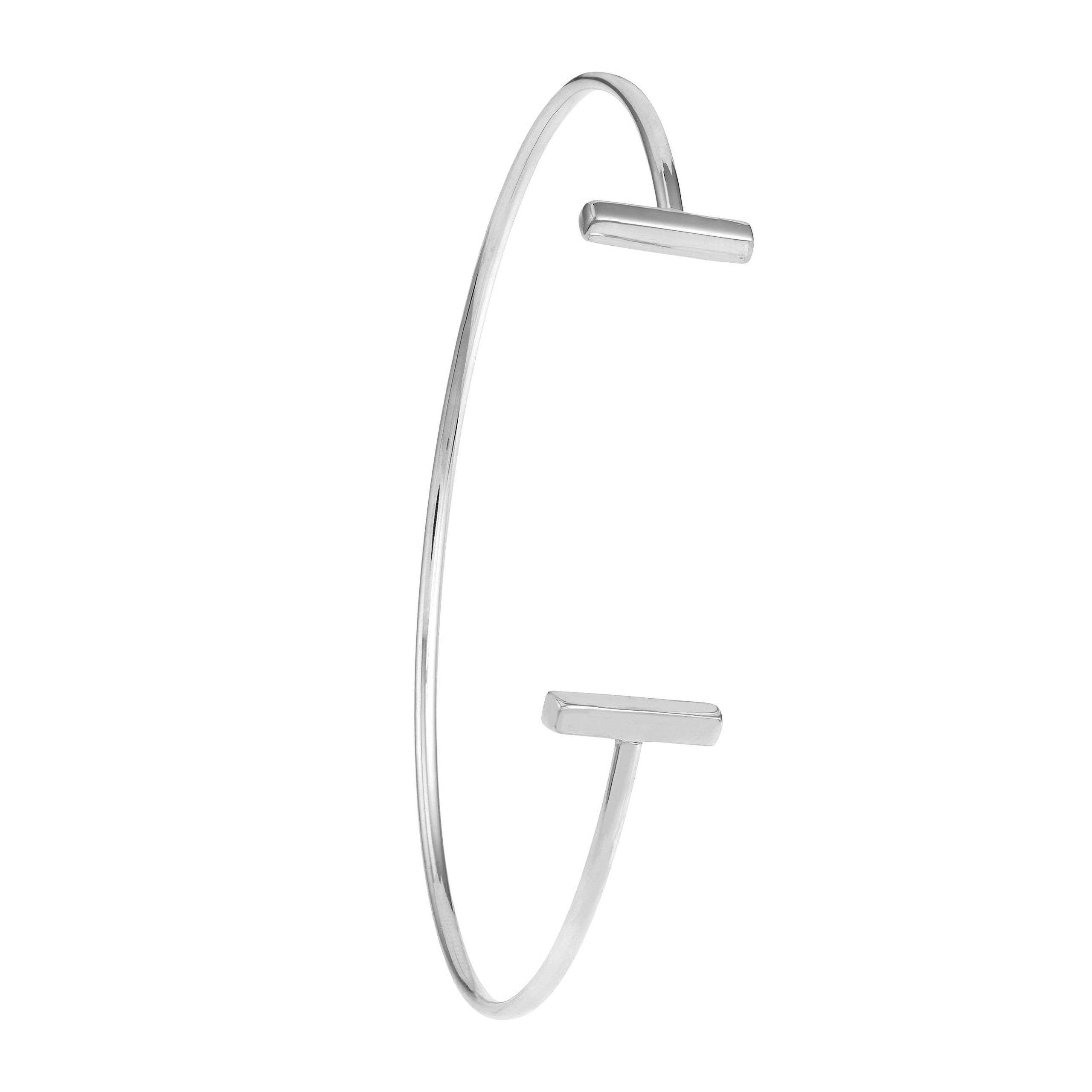 Minimalist silver bangle with sleek bar accents, timeless fine jewelry for everyday wear