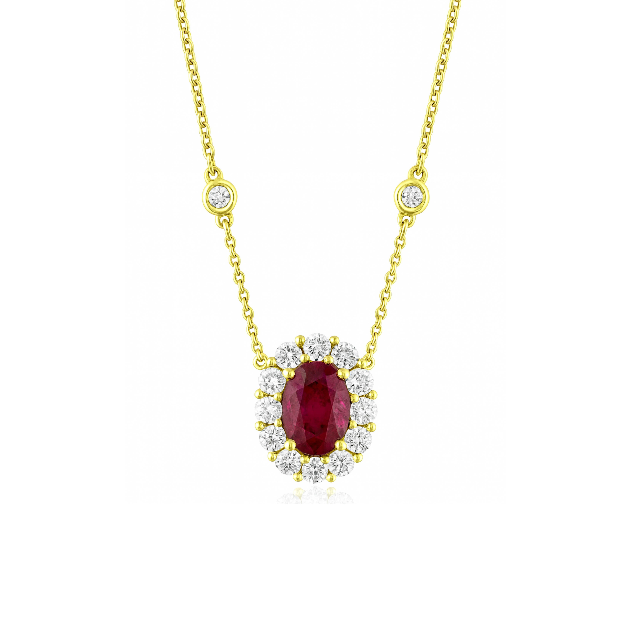 14K gold necklace with oval ruby pendant surrounded by diamonds, delicate chain with diamond accents