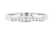 14K white gold diamond eternity band with channel-set round diamonds, timeless fine jewelry