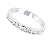 14K gold diamond eternity band with channel-set stones, timeless fine jewelry for everyday wear