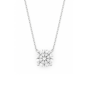 Solitaire diamond necklace in 14K gold with four-prong setting and delicate chain, timeless fine jewelry