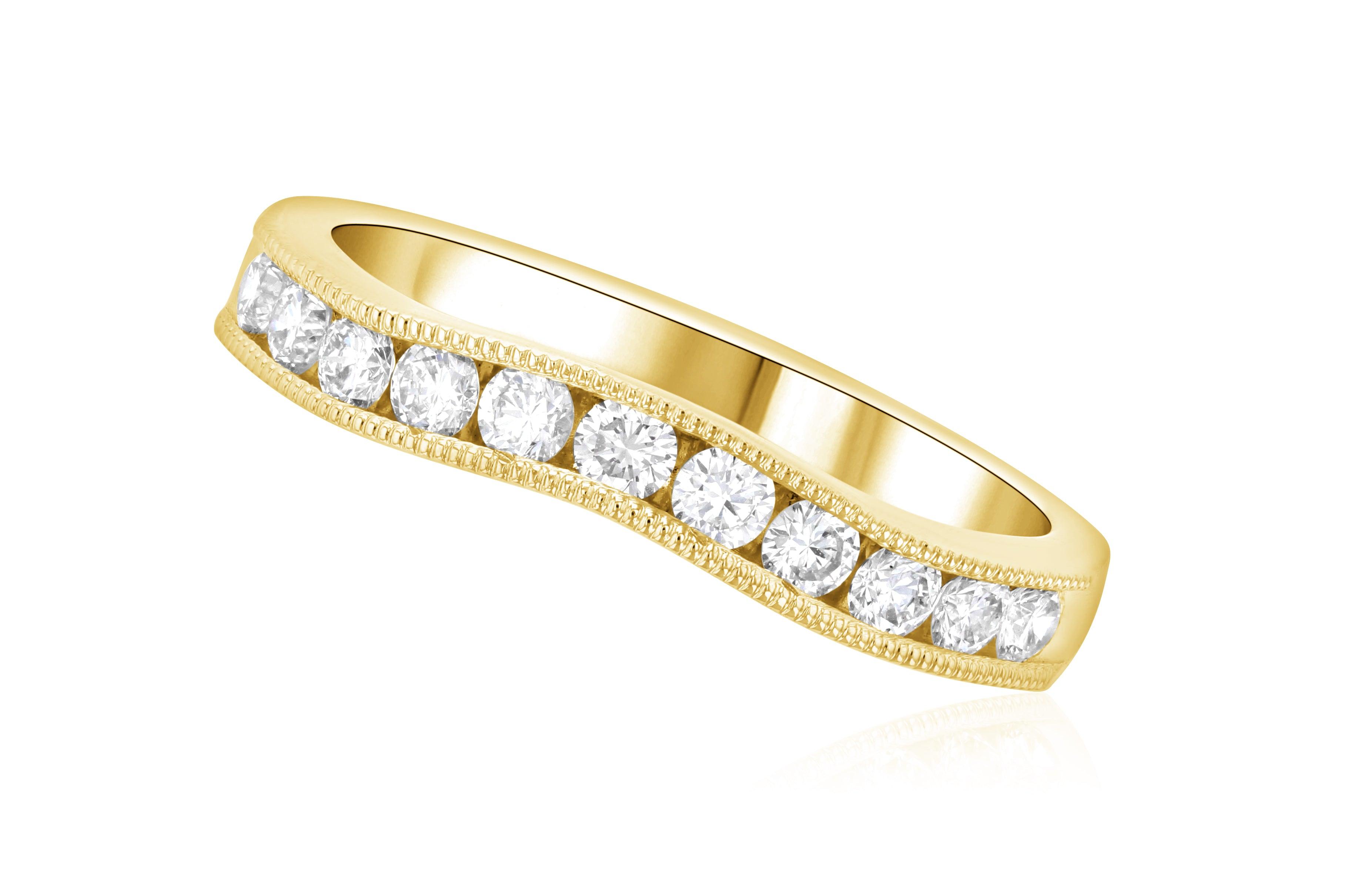 14K yellow gold diamond eternity band with channel-set round diamonds and milgrain detailing