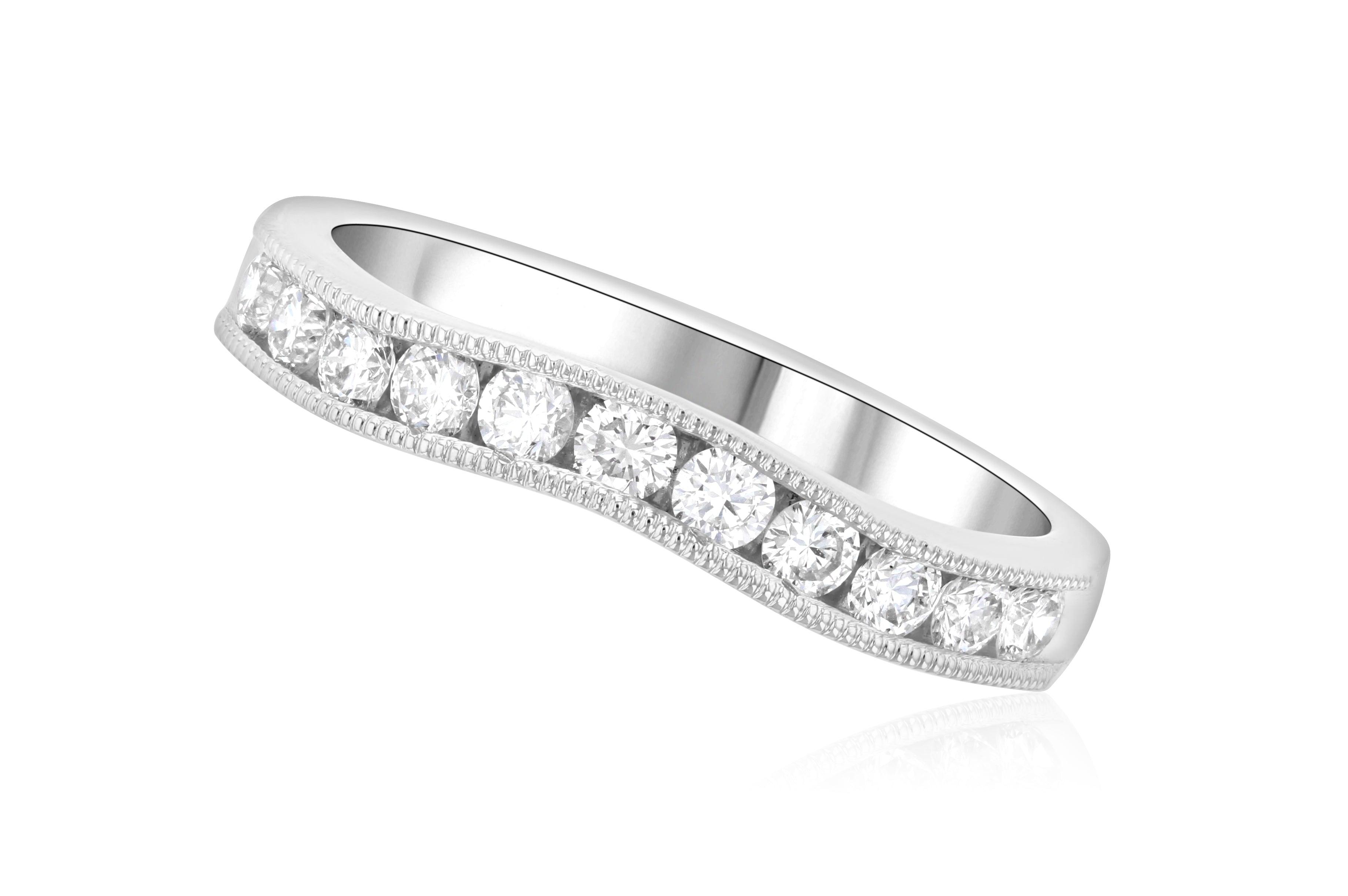Elegant 14K white gold diamond eternity band with milgrain detailing, perfect for everyday wear.