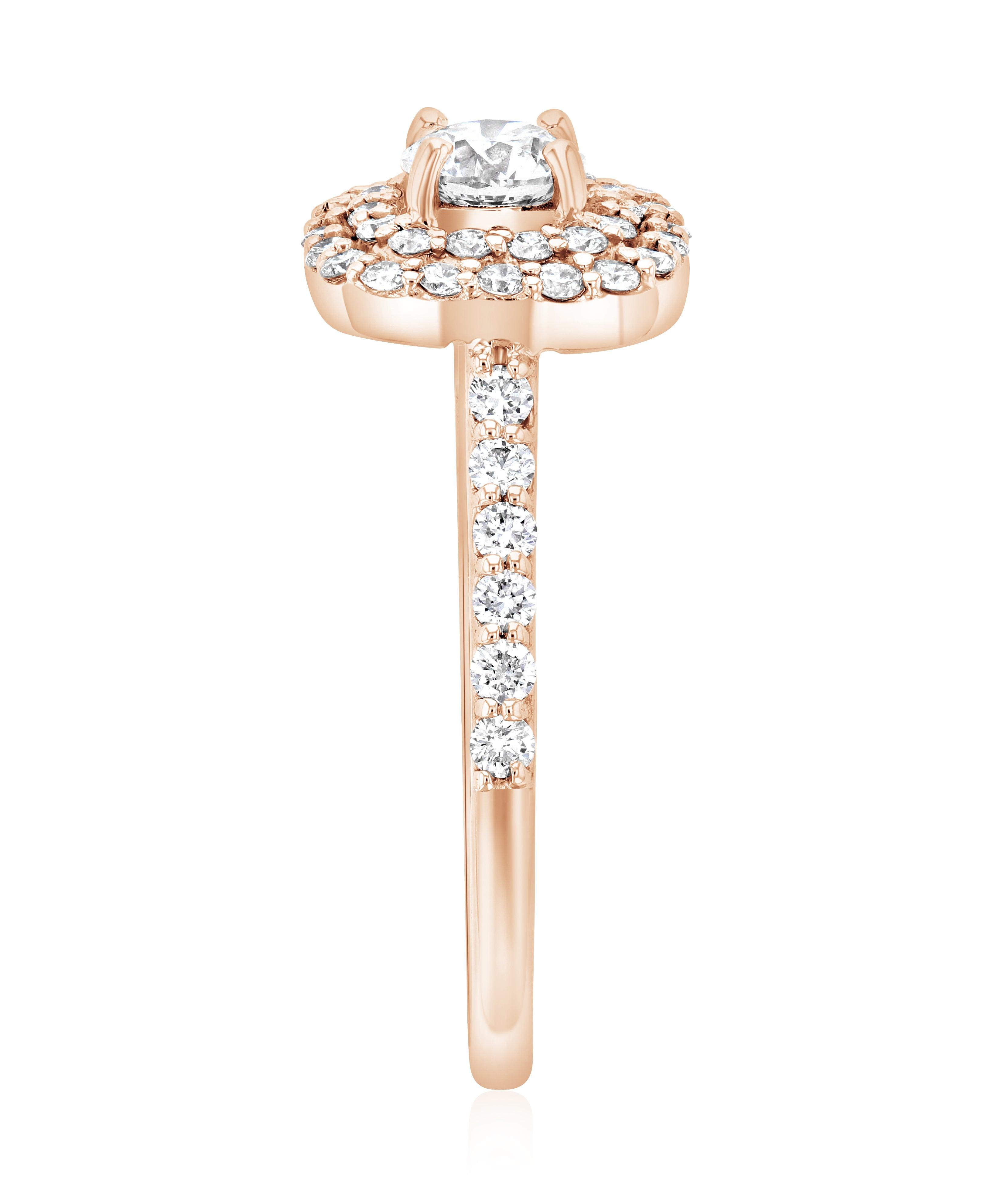 Rose gold diamond engagement ring with halo and channel-set side stones, timeless fine jewelry