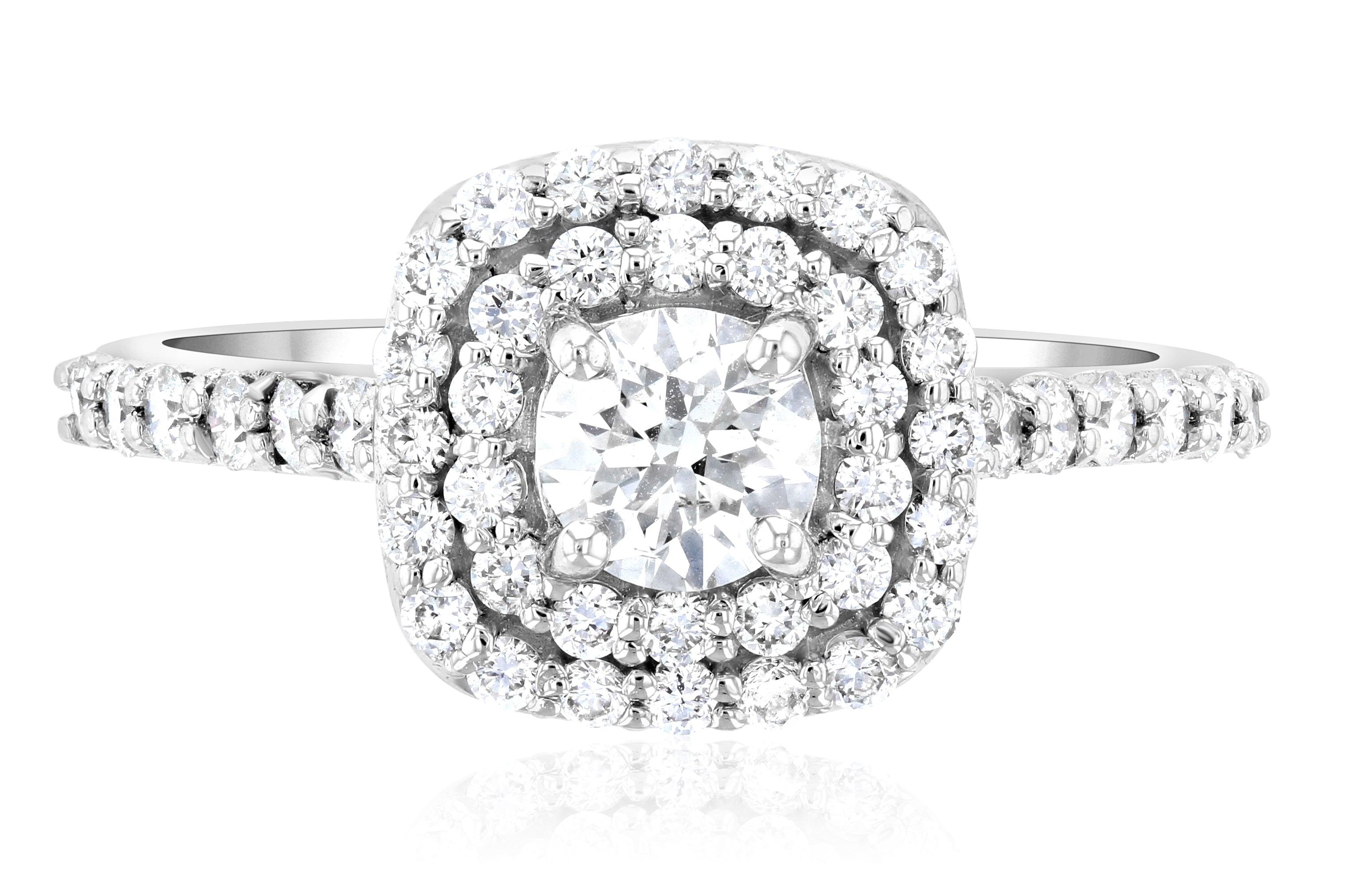 Elegant diamond halo engagement ring in 14K white gold with round center stone and pave band