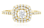 14K yellow gold diamond halo engagement ring with round center stone and pave band