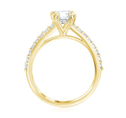 14K yellow gold diamond engagement ring with round center stone and channel-set side diamonds