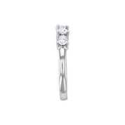14K white gold three-stone diamond ring with pear and round brilliants, timeless fine jewelry