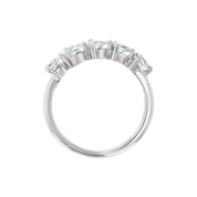 Elegant 14K gold ring with five baguette-cut diamonds, timeless fine jewelry for everyday wear