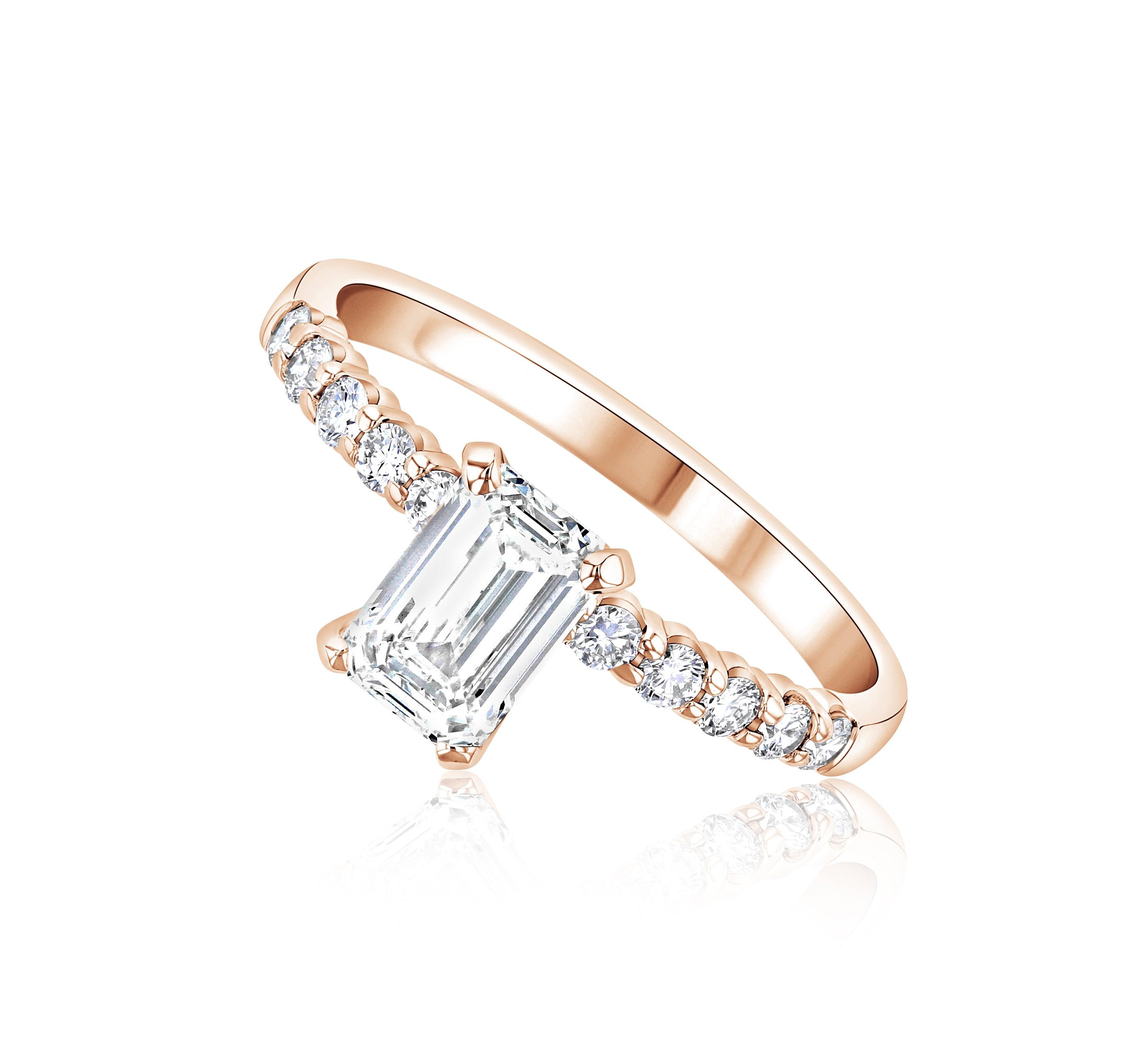 14K rose gold emerald cut diamond engagement ring with round diamond accents, timeless fine jewelry