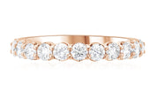 14K rose gold diamond eternity band with round brilliant stones, timeless fine jewelry