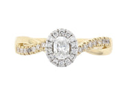 14K gold diamond engagement ring with oval center stone and halo, twisted band design