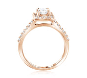 14K rose gold engagement ring with emerald cut diamond and halo side stones