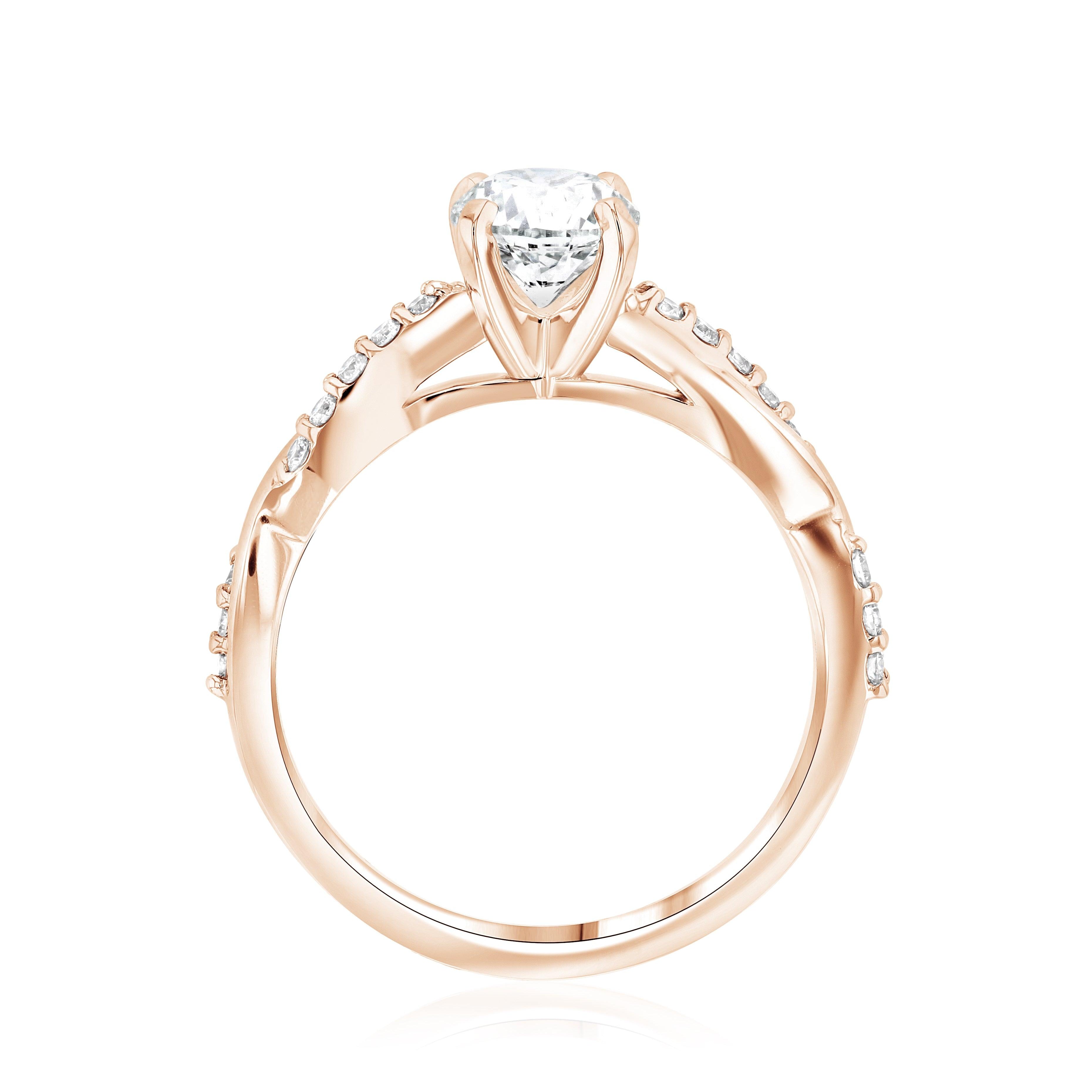 14K rose gold engagement ring with round diamond center and side stones, timeless fine jewelry
