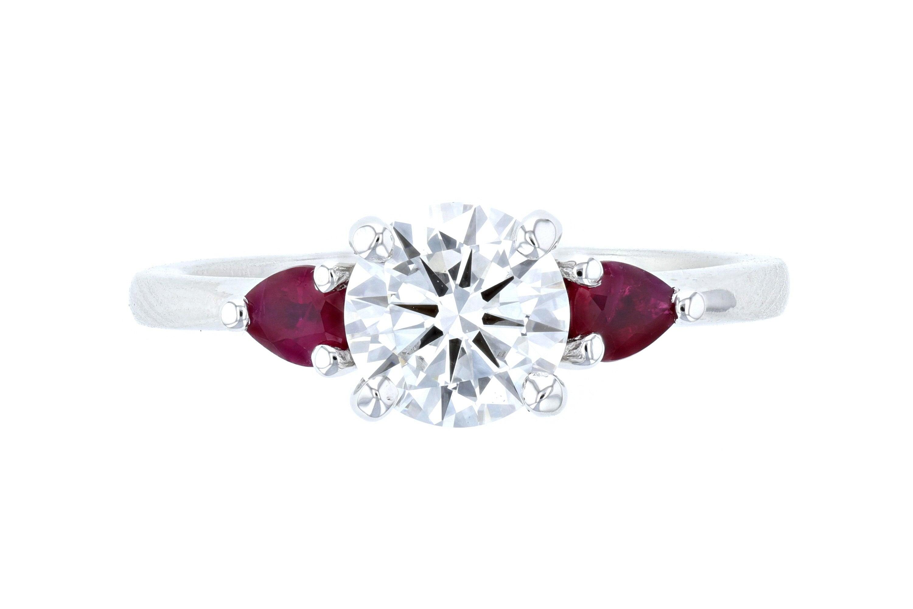 Diamond and ruby three-stone engagement ring in 14K white gold, timeless fine jewelry