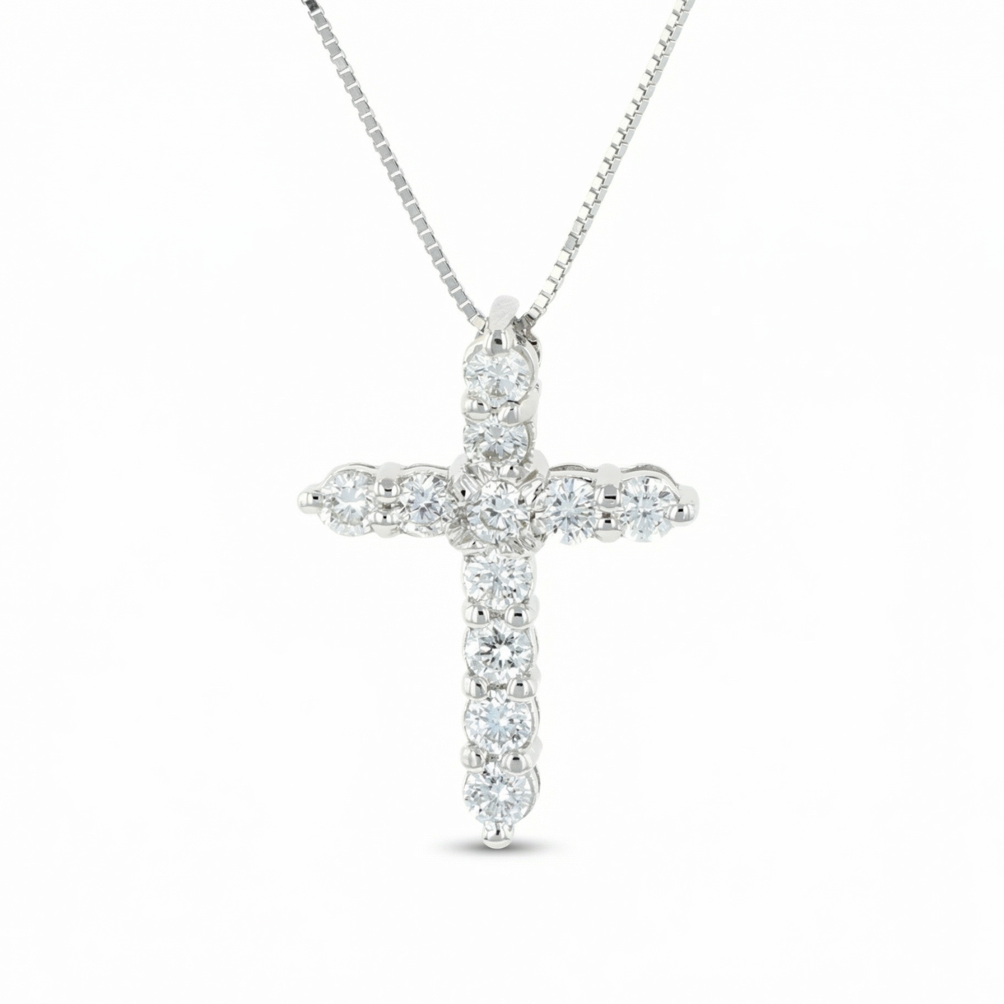 Diamond cross pendant necklace in 14K gold, timeless fine jewelry with sparkling stones on a box chain