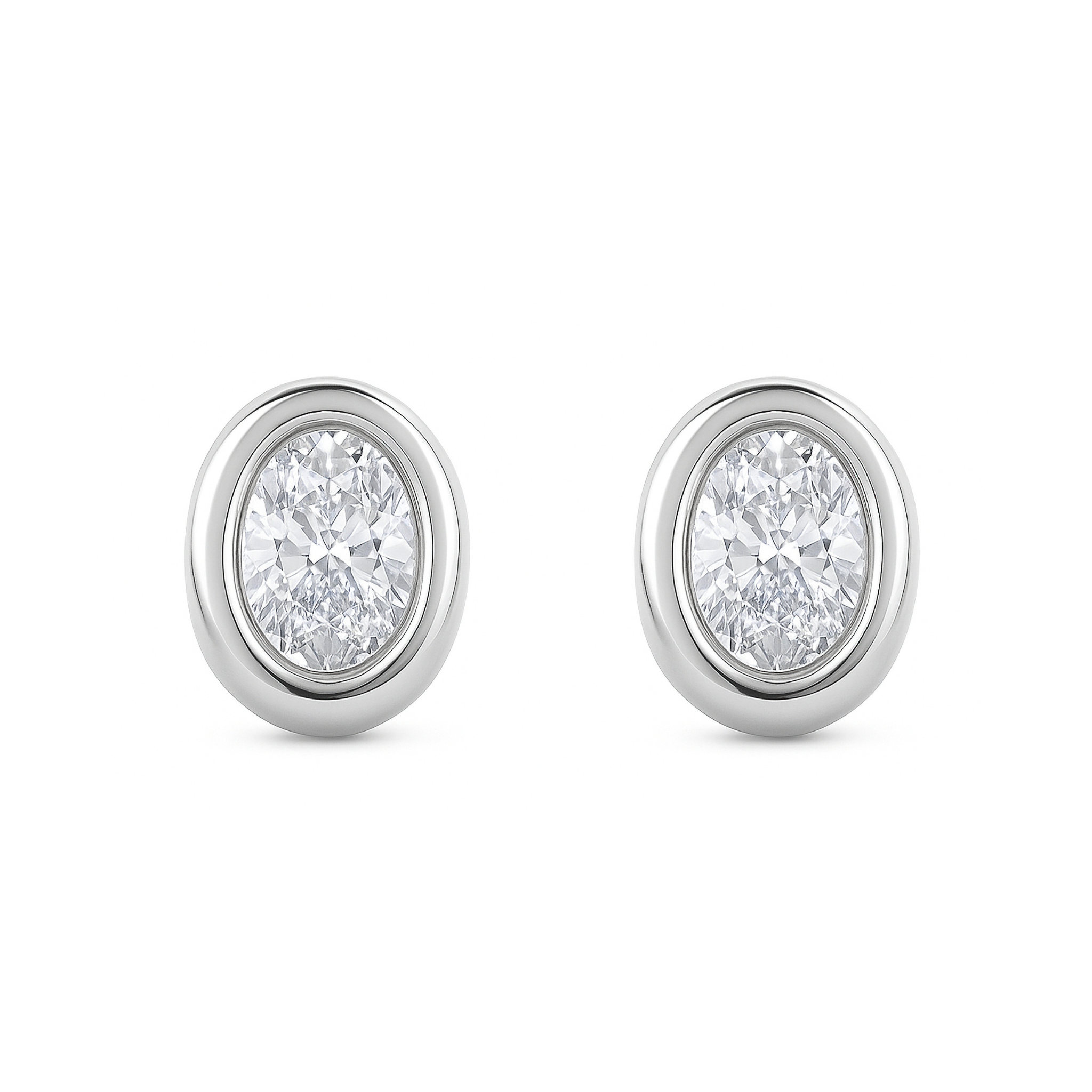 Oval diamond stud earrings in 14K white gold, timeless fine jewelry for everyday wear