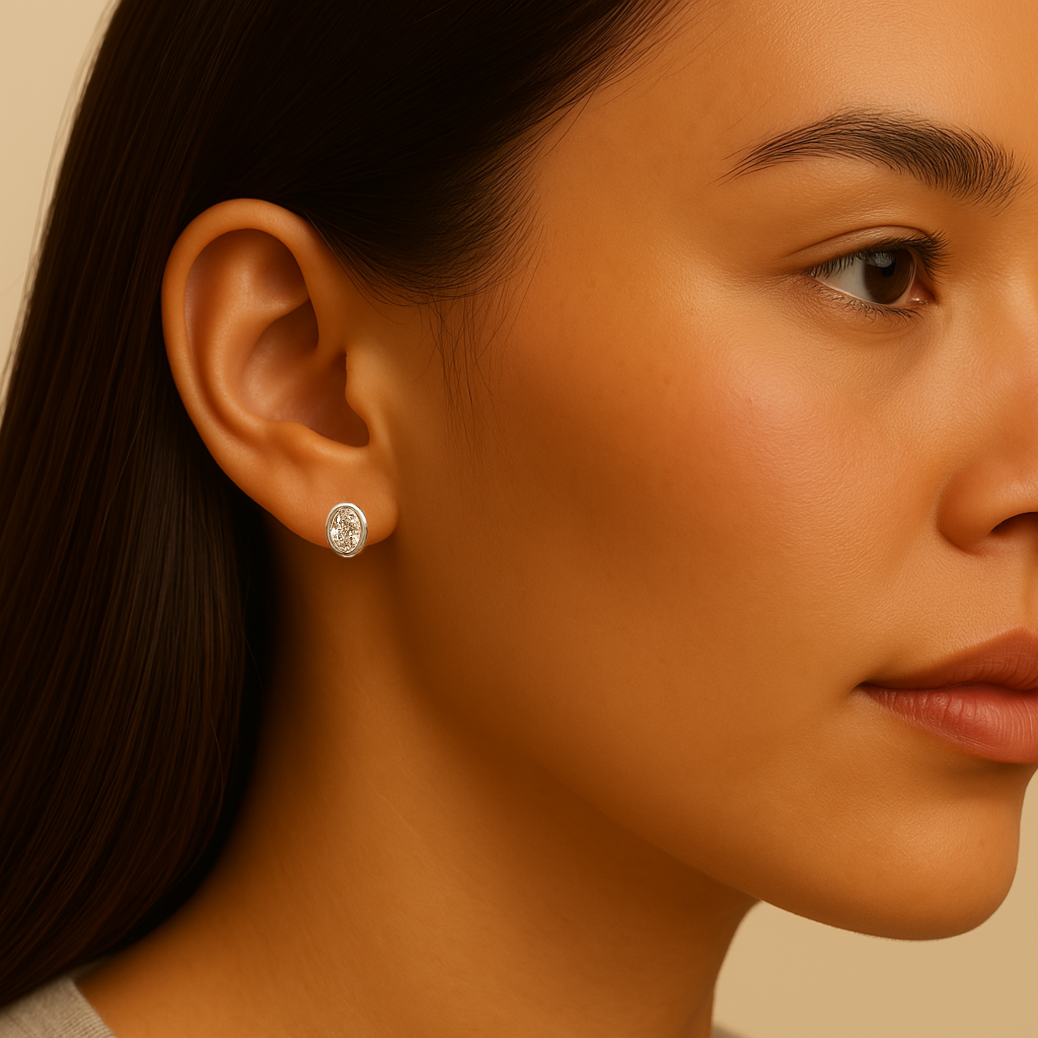 Elegant 14K gold diamond stud earring worn on ear, timeless fine jewelry design