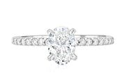 Oval diamond engagement ring with pave band in 14K white gold, timeless fine jewelry