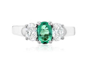 Emerald and diamond three-stone ring in 14K white gold, timeless fine jewelry design