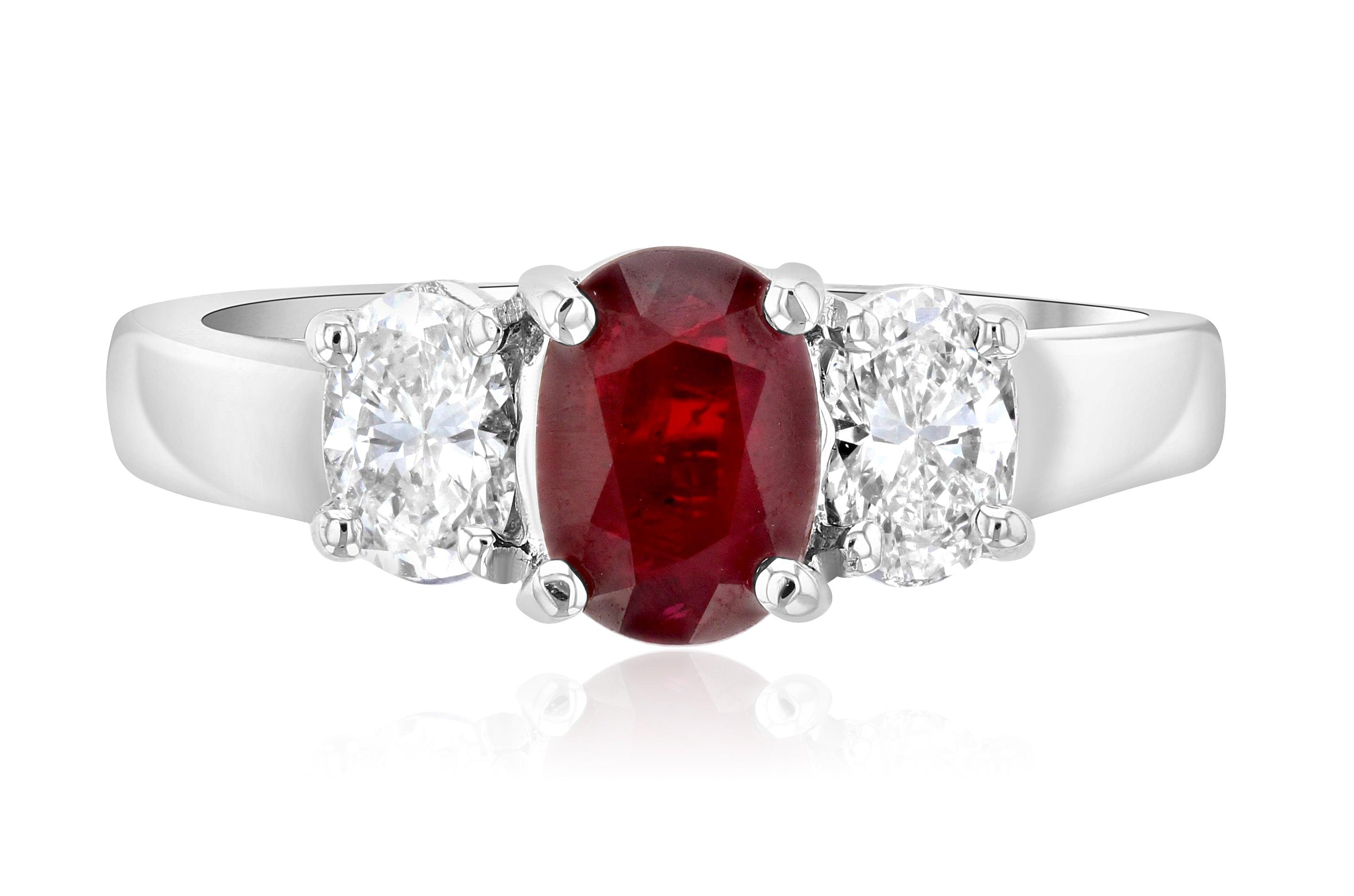 Elegant 14K gold ring with oval ruby center and diamond accents, timeless fine jewelry