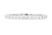 Elegant diamond eternity band in 14K white gold, timeless fine jewelry for everyday wear