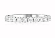 Elegant 14K gold diamond eternity band with round brilliant stones, perfect for everyday fine jewelry.