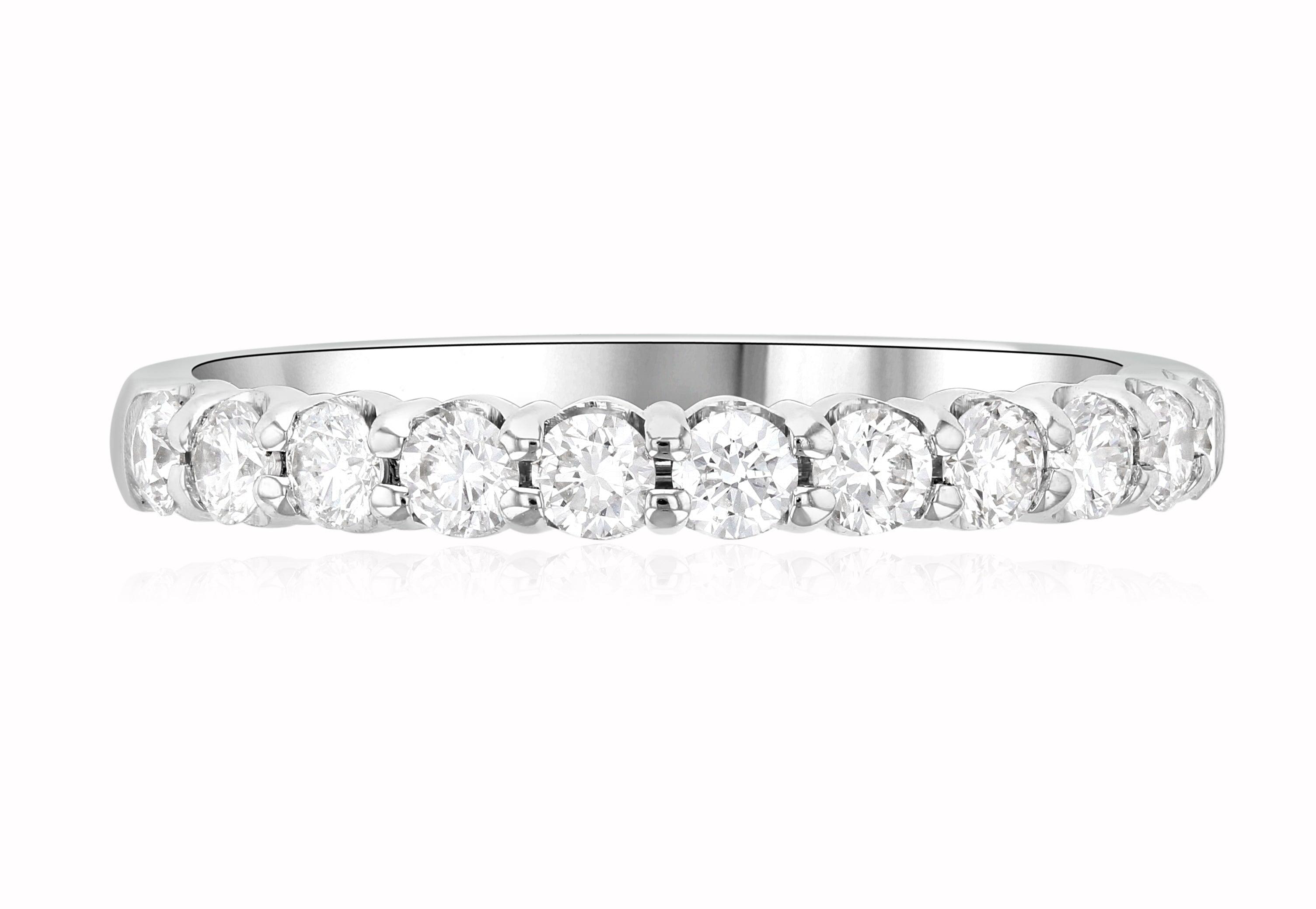 Elegant 14K gold diamond eternity band with round brilliant stones, perfect for everyday fine jewelry.