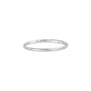 Delicate 14K gold ring with scattered diamonds, perfect for everyday wear or stacking.