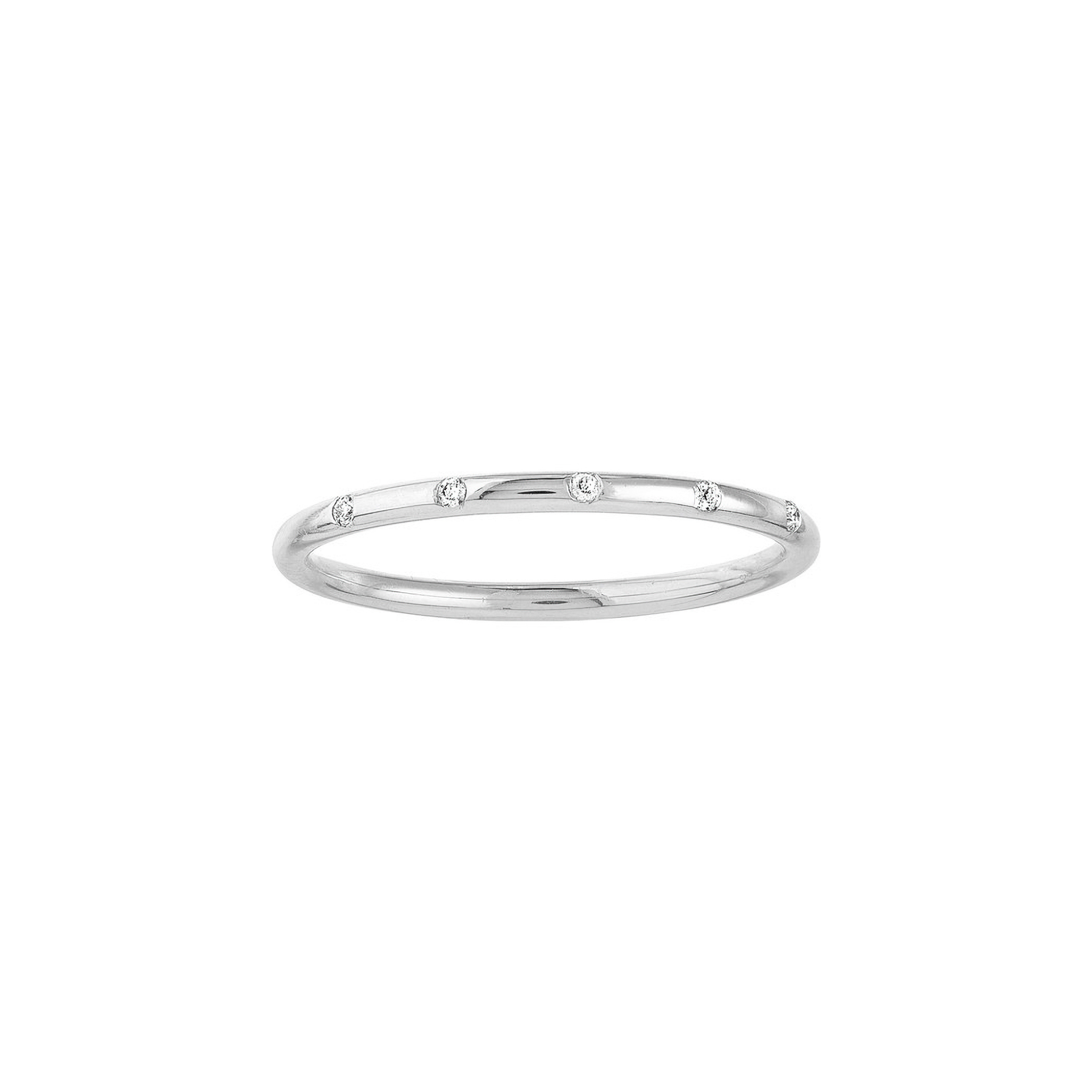 Delicate 14K gold ring with scattered diamonds, perfect for everyday wear or stacking.