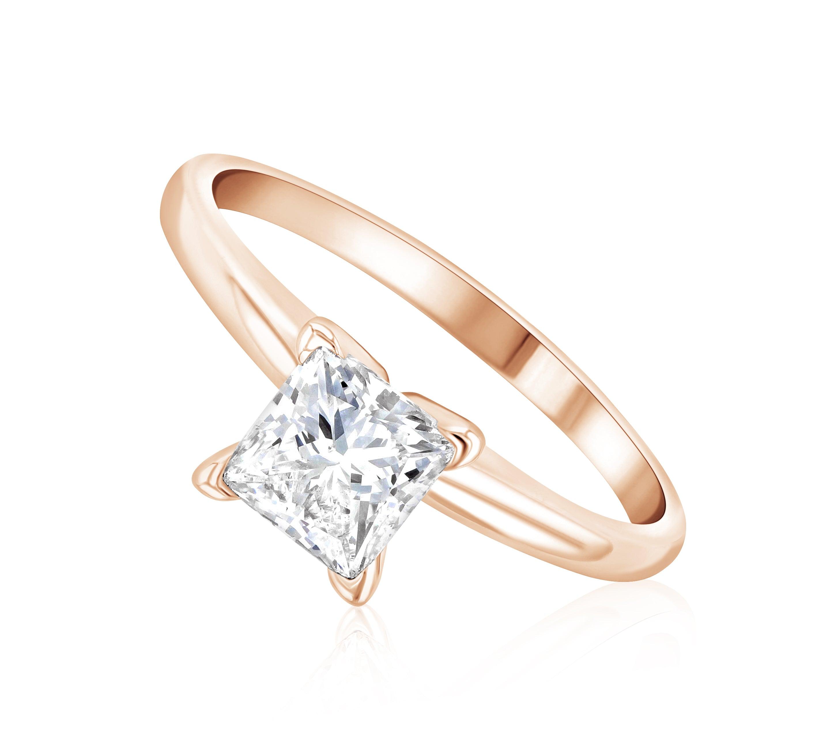Rose gold solitaire ring with princess cut diamond, timeless fine jewelry