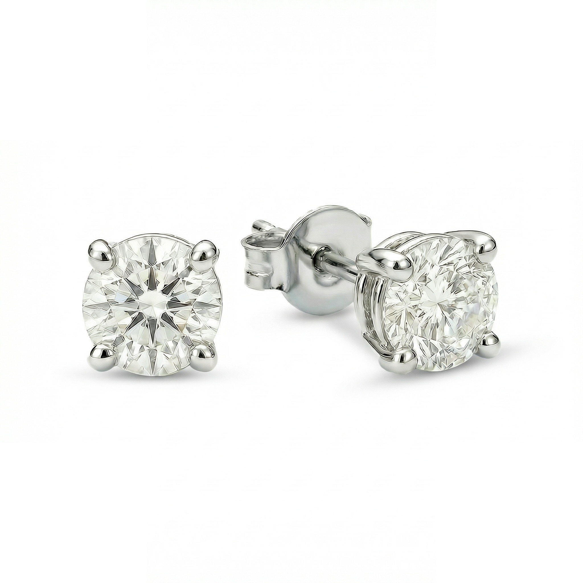Classic 14K gold diamond stud earrings with four-prong setting, timeless fine jewelry for everyday wear