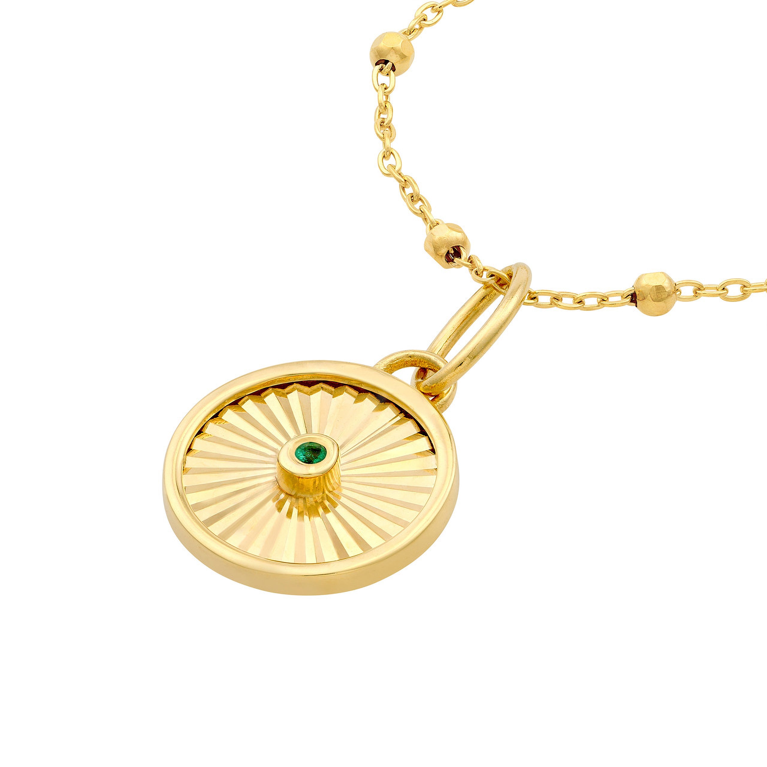 14K gold necklace with sunburst pendant and emerald center, timeless fine jewelry design