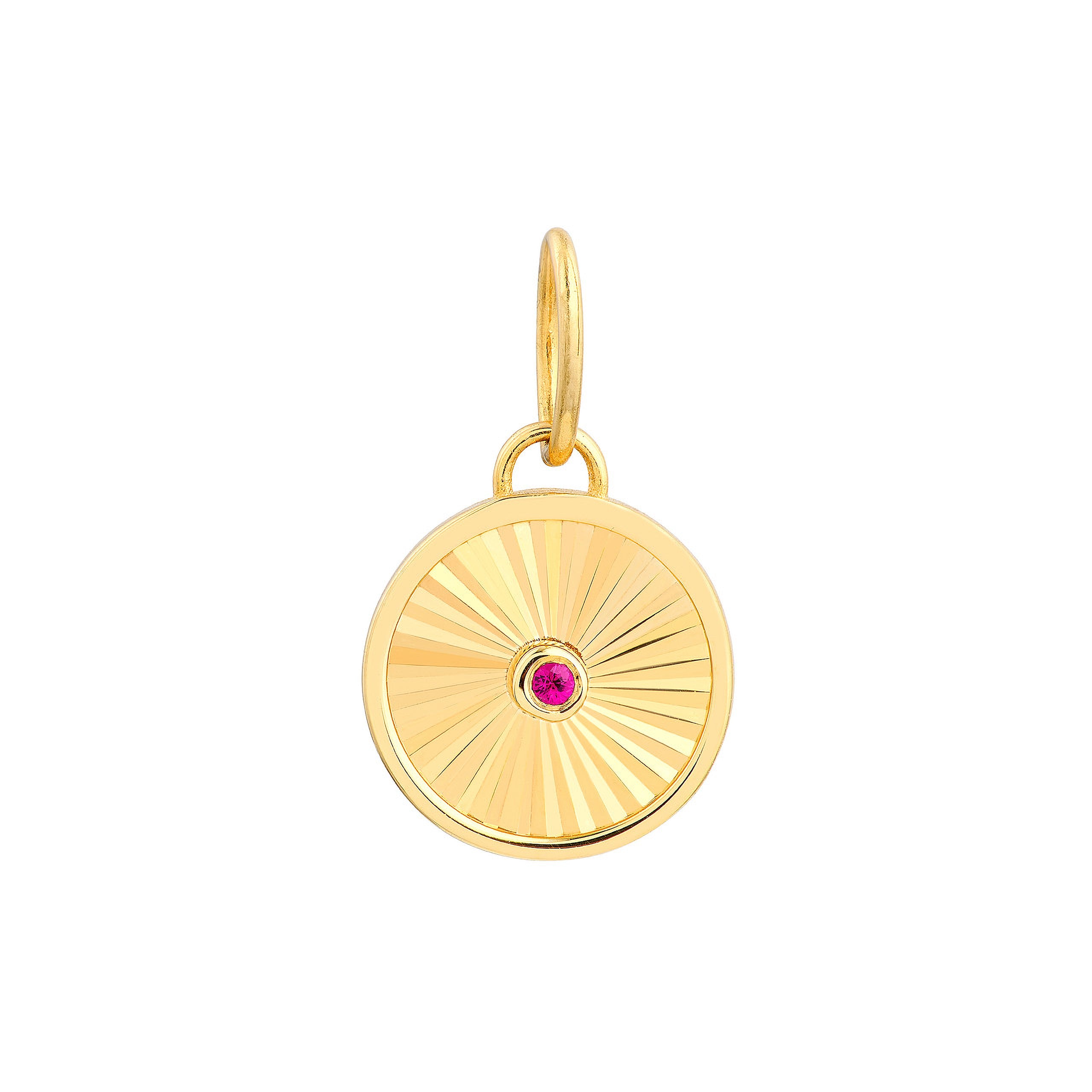 14K gold charm with sunburst design and pink gemstone center, fine jewelry pendant