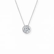 Elegant diamond solitaire necklace in 14K gold with delicate chain, timeless fine jewelry for everyday wear