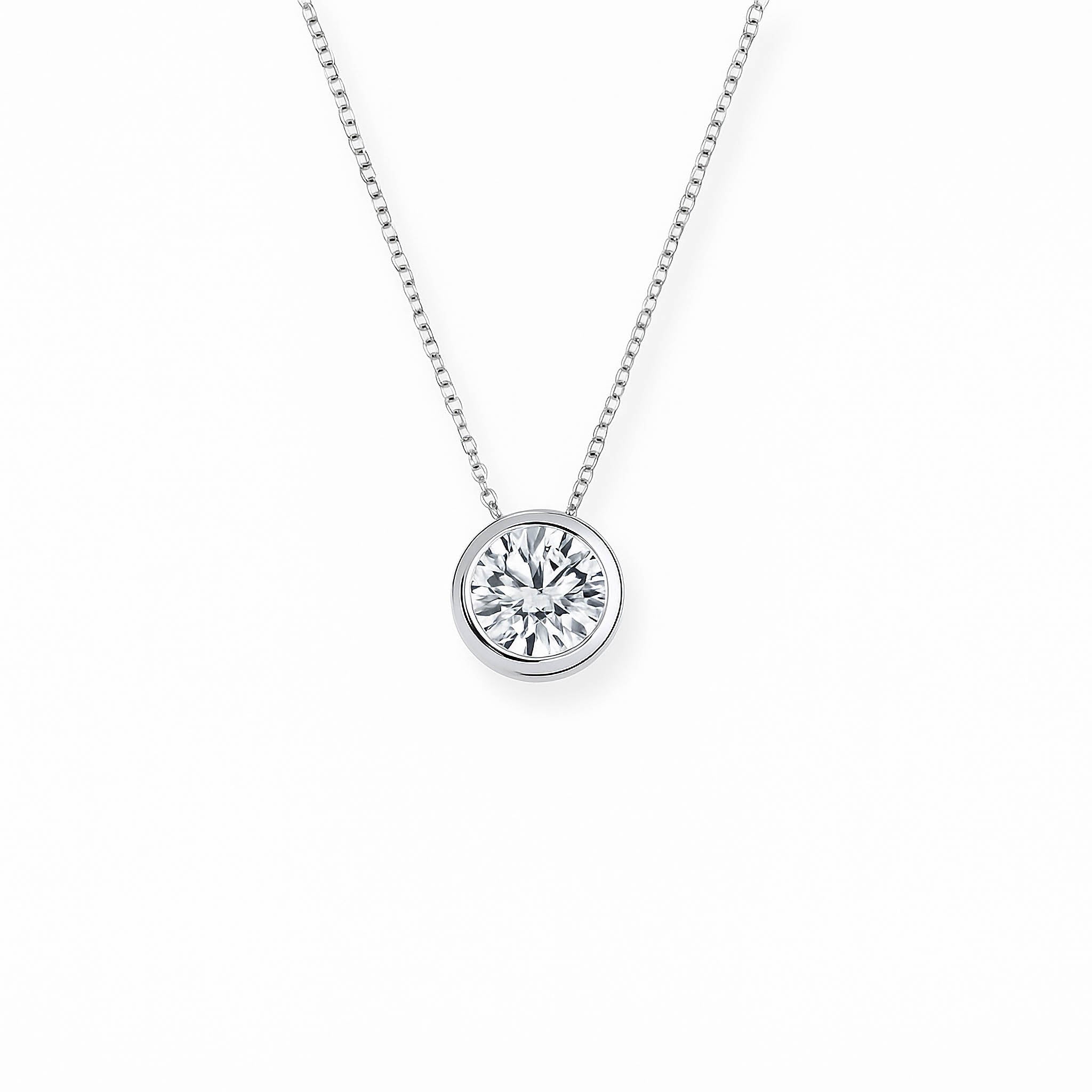 Elegant diamond solitaire necklace in 14K gold with delicate chain, timeless fine jewelry for everyday wear