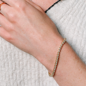 14K gold diamond tennis bracelet on wrist, everyday fine jewelry
