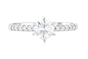 Round diamond solitaire engagement ring with pave band in 14K white gold, timeless fine jewelry