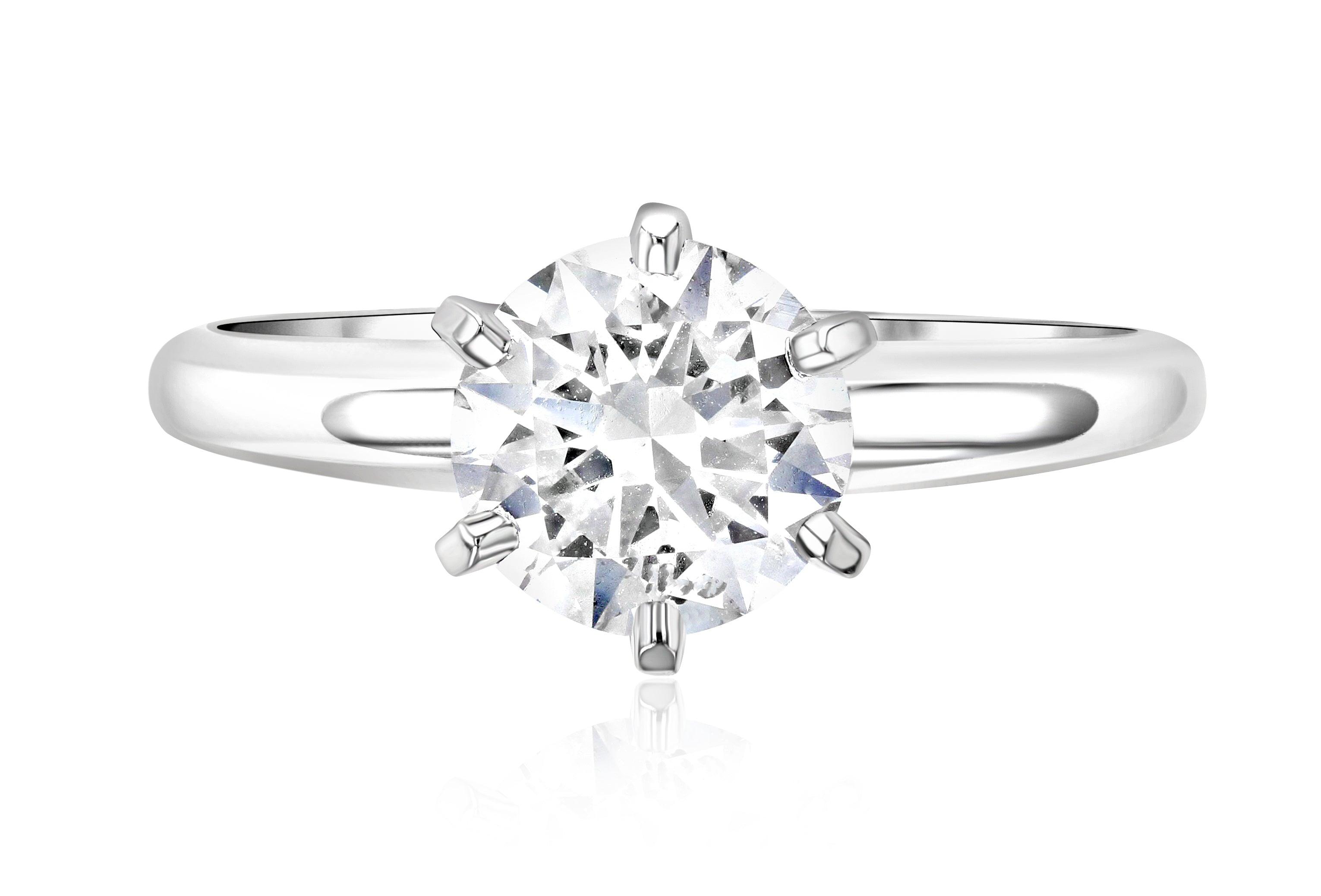 Solitaire diamond engagement ring in 14K white gold with six prongs, timeless fine jewelry design