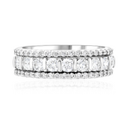 Three 14K white gold diamond bands stacked, featuring round brilliant and channel-set diamonds for timeless elegance.