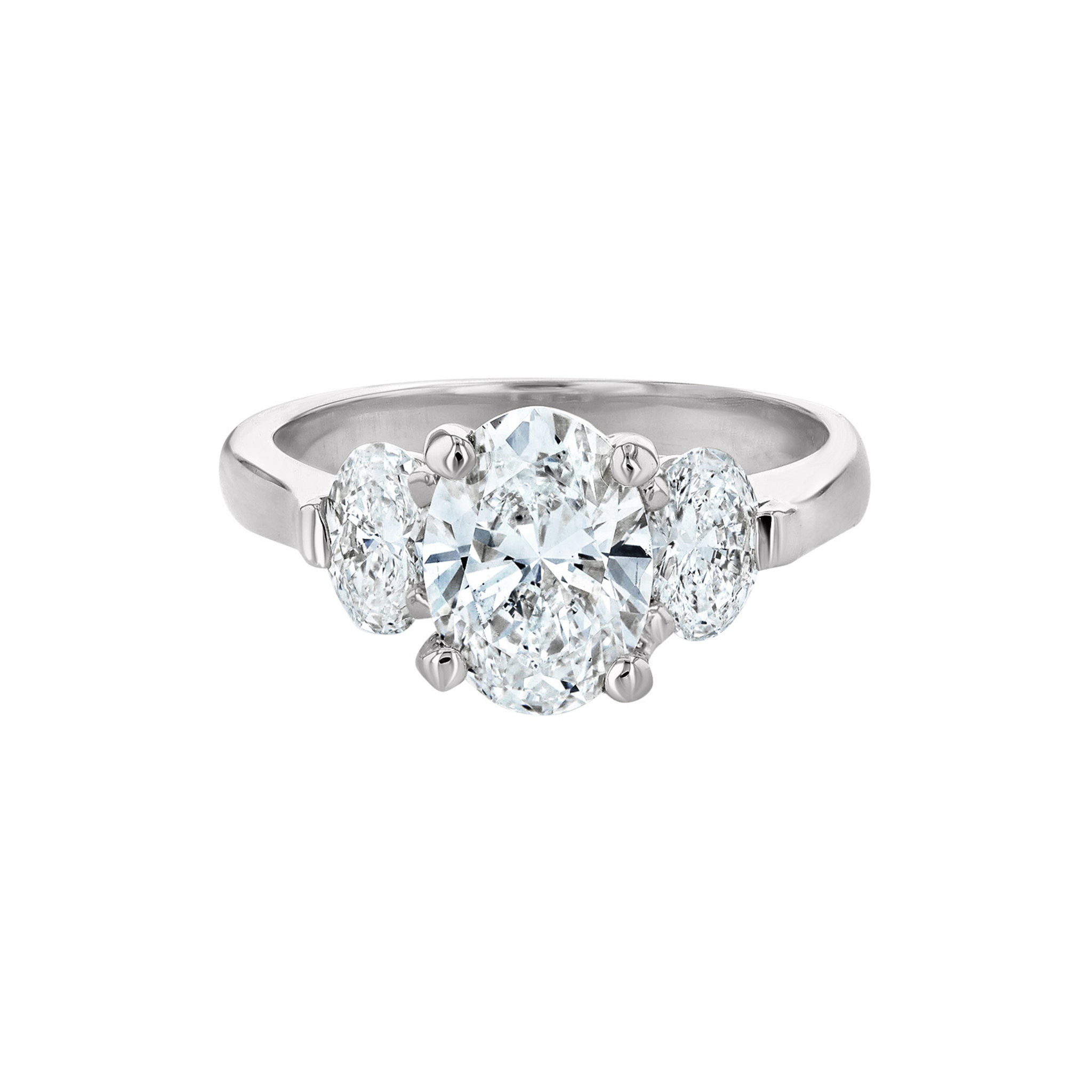 Three-stone oval diamond engagement ring in 14K white gold, timeless fine jewelry design