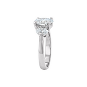Elegant 14K gold engagement ring with oval diamond center and side stones, timeless fine jewelry design