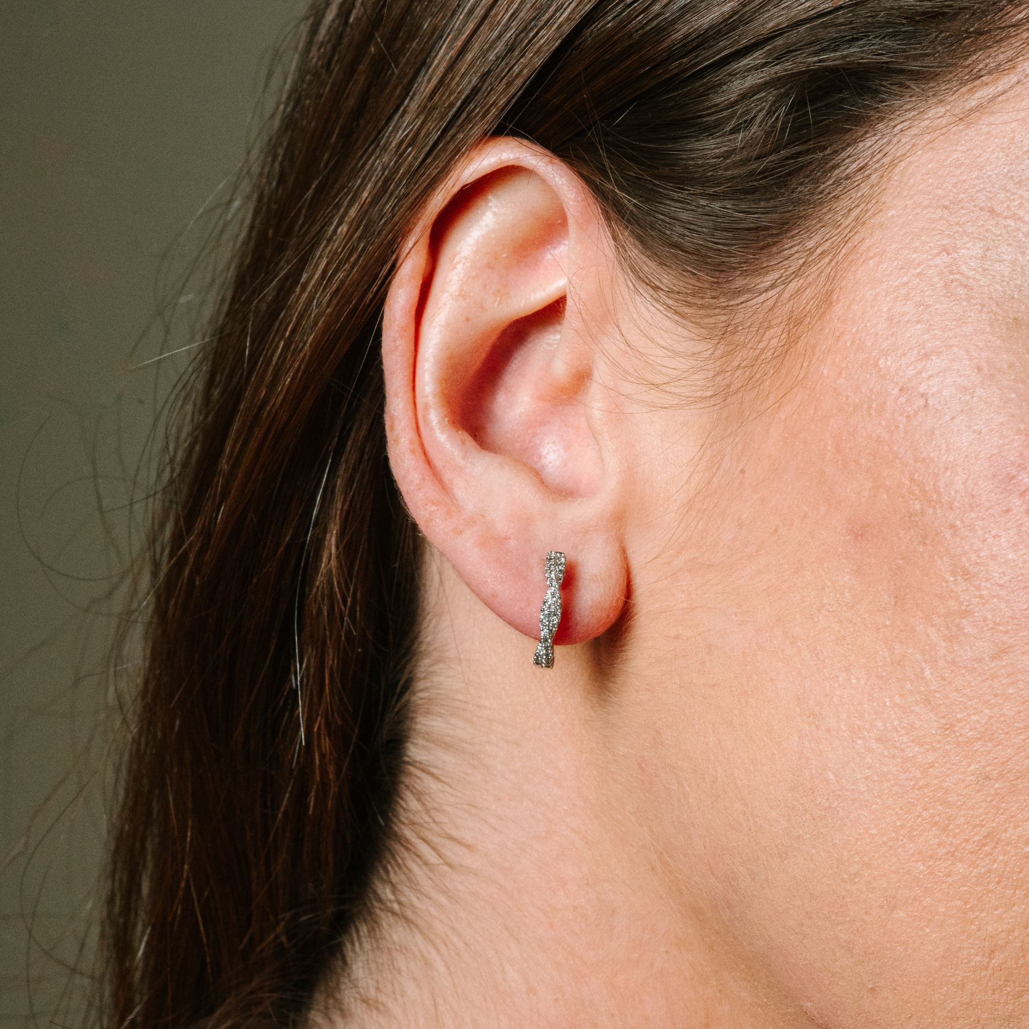 Elegant diamond stud earrings in 14K gold, perfect for everyday wear and timeless style.